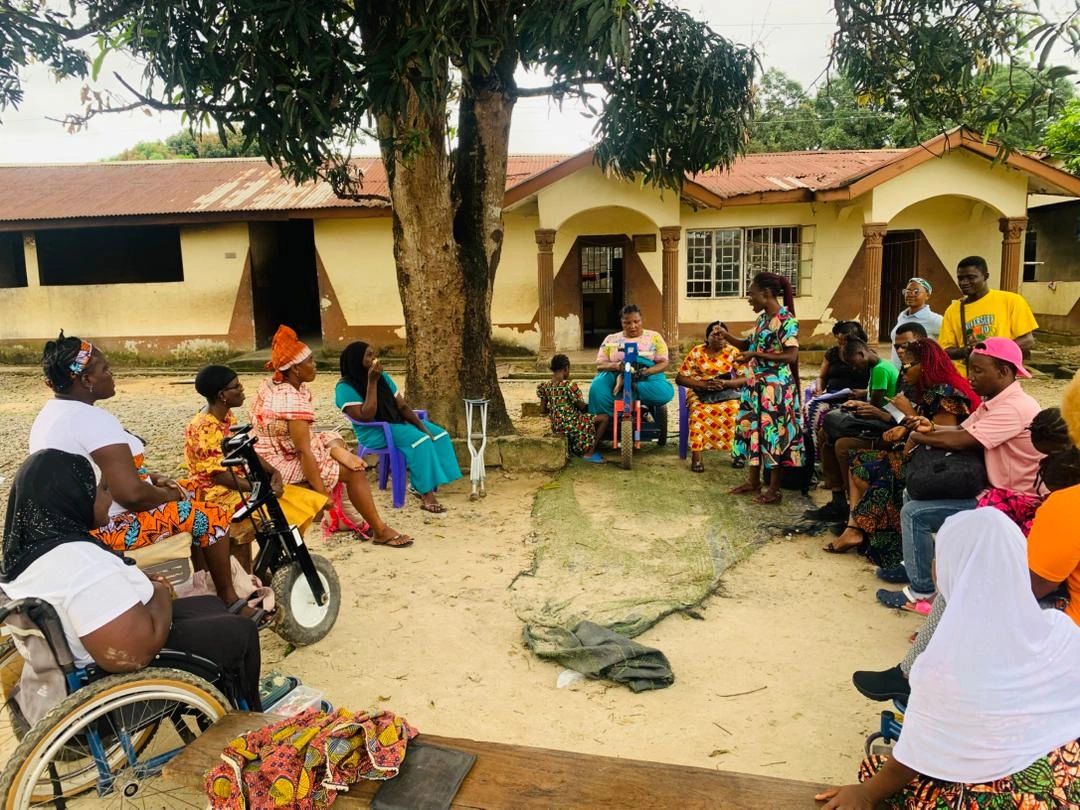 An IHD field session engaging with women with disabilities during a community advocacy gathering in Bo, Sierra Leone